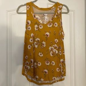 Maurice’s size medium tank top. Mustard yellow with flowers.